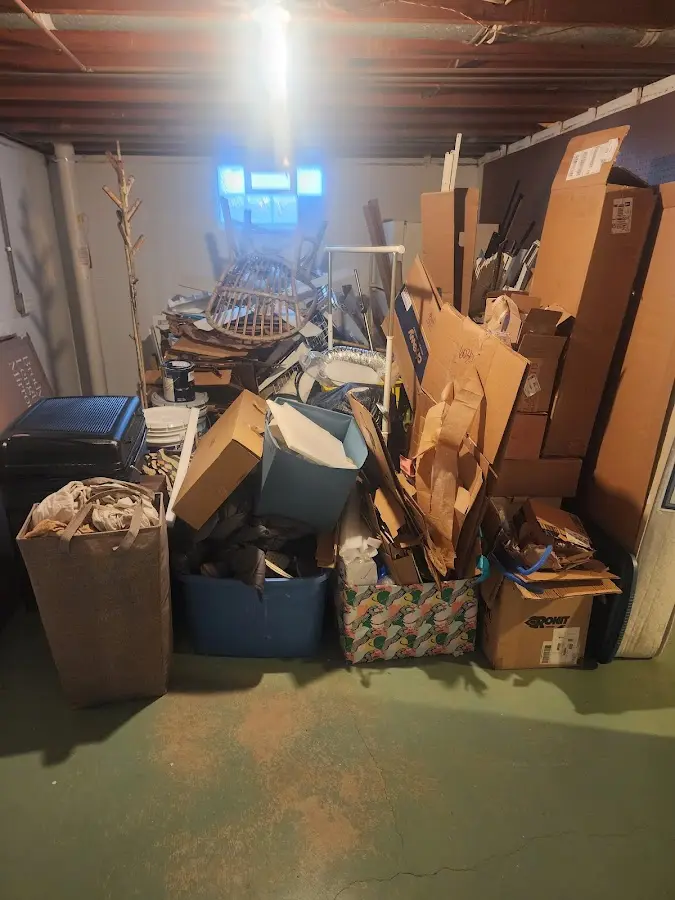 Roll-off dumpster container at job site for 6 Yard Dumpster Rental in Scottdale